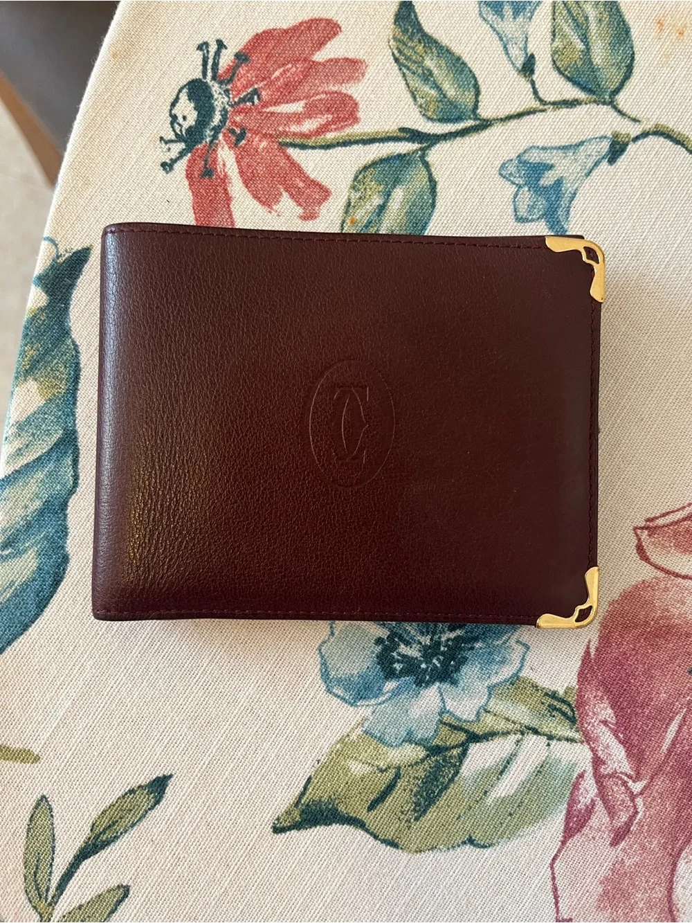 Cartier Men's Burgundy Leather Bifold Wallet with Gold Corners